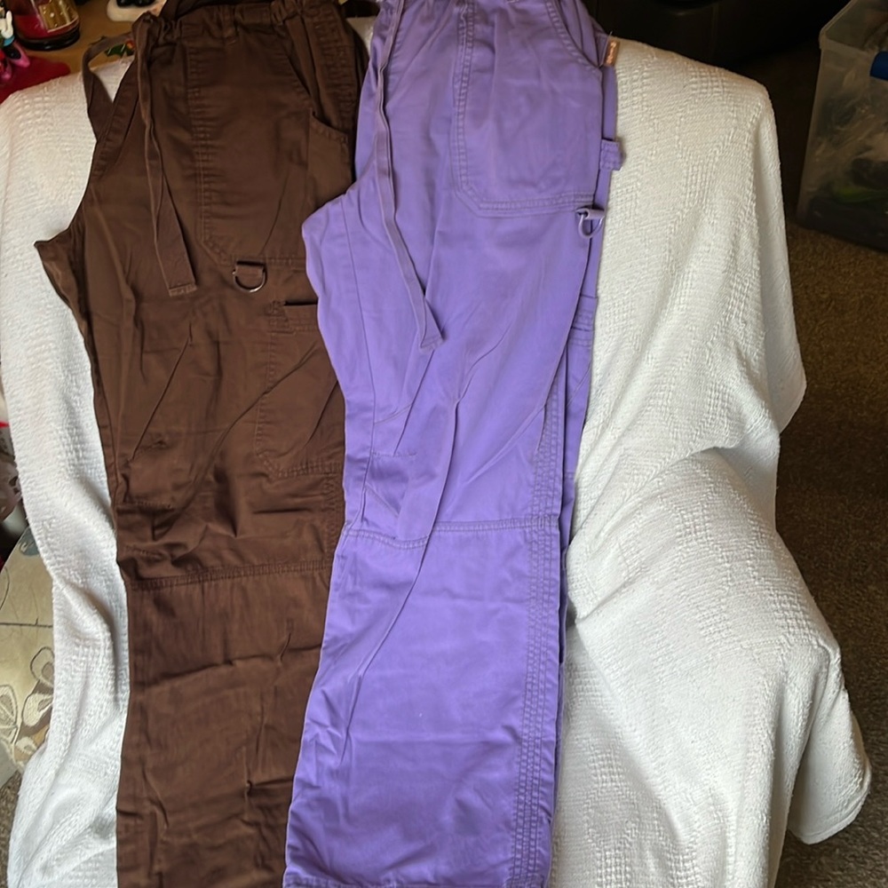 Two pair of EUC Koi cargo scrub pants